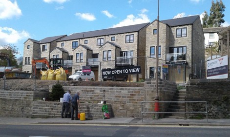 Local House builders Donate Flower Bed to Community